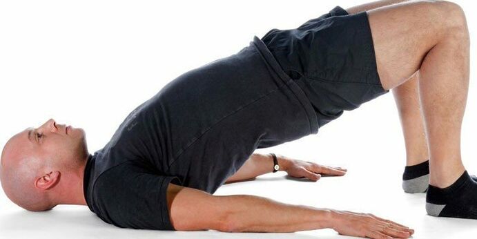 A man performs the Arch exercise to improve potency